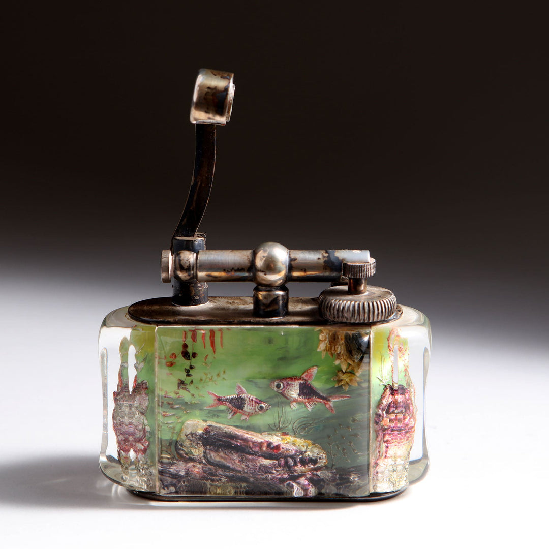 Dunhill Aquarium Table Lighter with scalar fish design in lucite by Collection JA10, mid-century British vintage piece.