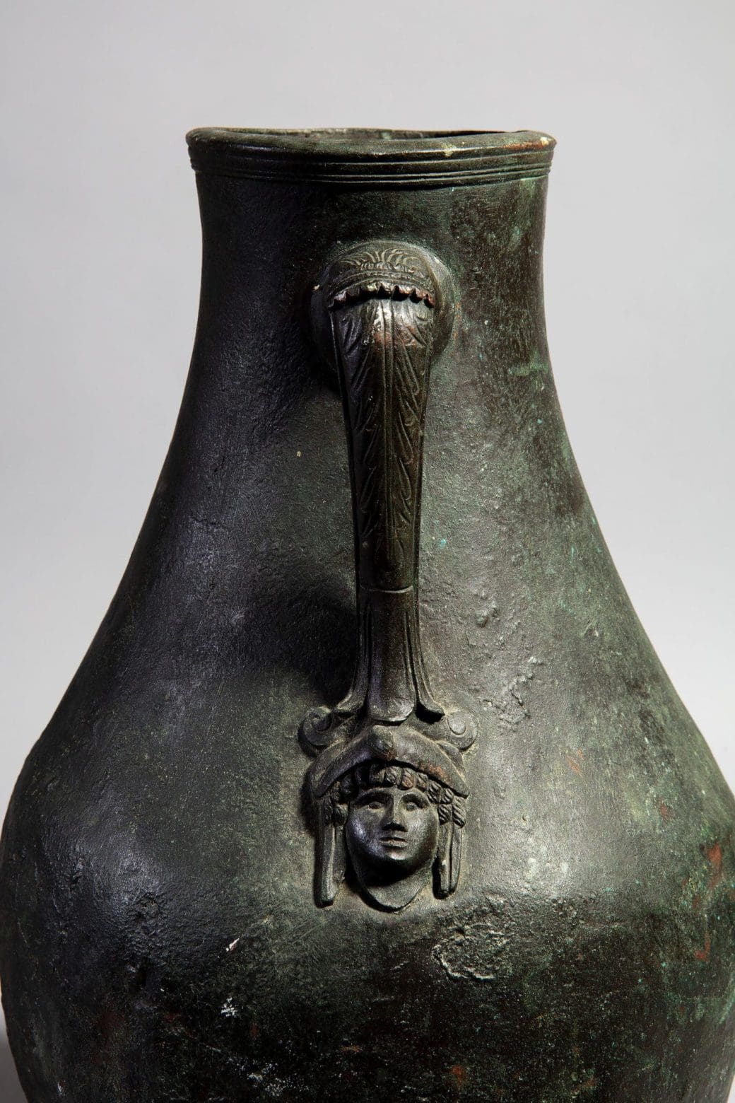 Grand Tour Neapolitan bronze vase with classical face handle detail, circa 1900, Collection TH20.