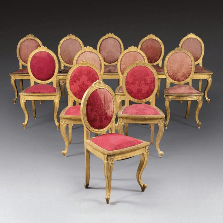 Set of 12 Anglo Indian side chairs with giltwood frames and red damask upholstery by Collection EE30