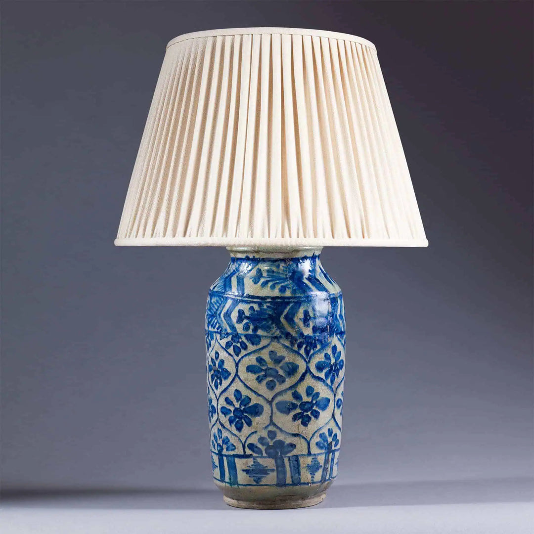 Qajar pottery Vase mounted as a Lamp with blue floral geometric patterns on a glazed biscuit base circa 1850.