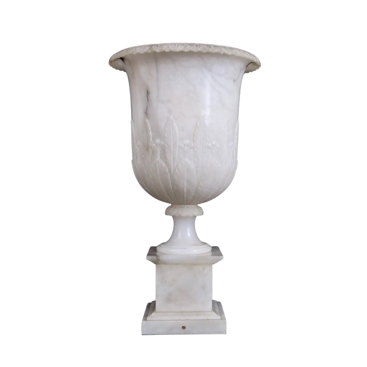 Neoclassical Alabaster Vase on stand, white alabaster with floral reliefs, circa 1900, fitted for illumination.
