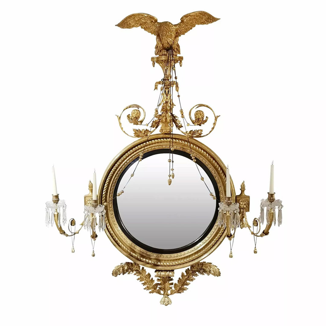 Irish Regency Convex Mirror Signed Arthur Williams with giltwood frame, eagle crest, and four candle arms circa 1815.