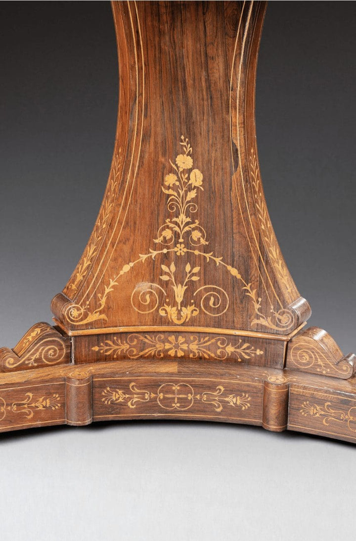 Charles X Rosewood Marquetry Guéridon Table detailed floral inlay on rosewood base circa 1825 with intricate craftsmanship.