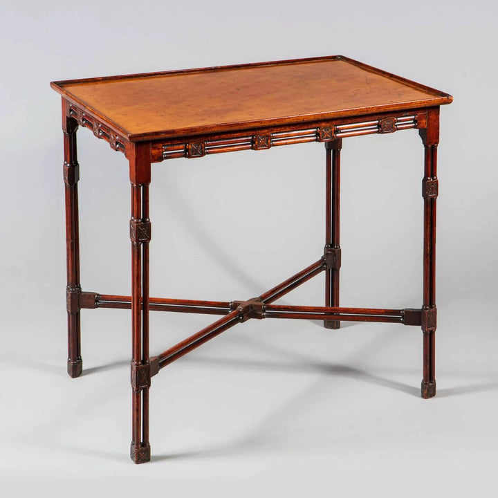 A George III mahogany silver table with cluster column legs and double-column x frame stretcher, circa 1765.