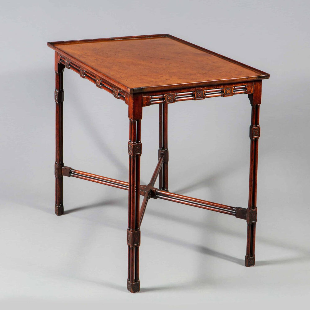 A George III mahogany silver table with cluster column legs and double-column x frame stretcher, England circa 1765.