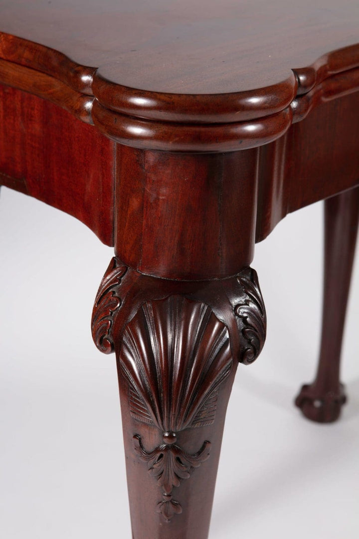 George III Mahogany Card Table with carved scallop shells on cabriole legs and rich mahogany finish.