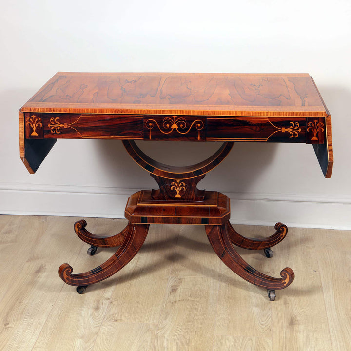 George III Rosewood & Kingwood Sofa Table circa 1820 with decorative inlay and drop-leaf extension in British Isles style.