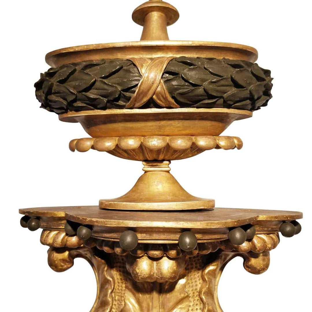 Regency Parcel Gilt Fragment of a Mirror Crest with carved wooden laurel leaves and gilded details, England circa 1810.