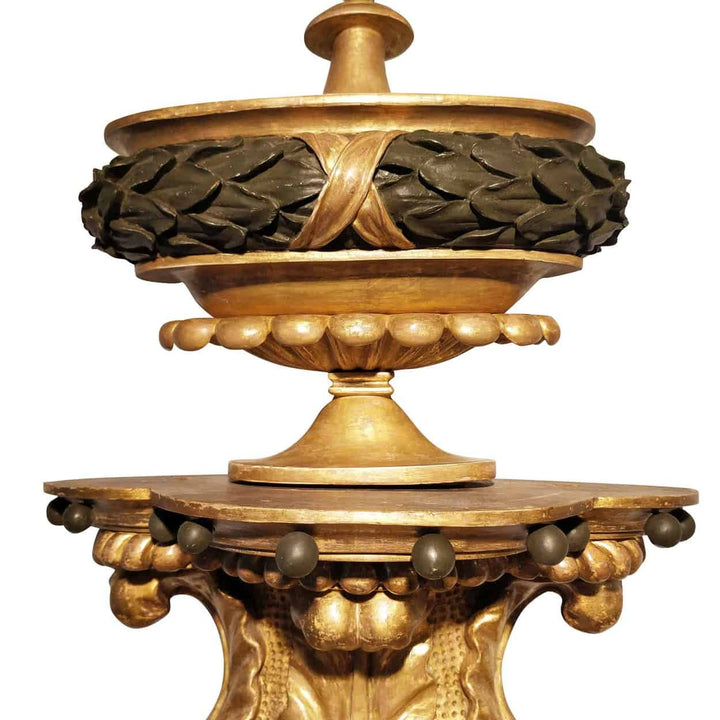 Regency Parcel Gilt Fragment of a Mirror Crest with carved wooden laurel leaves and gilded details, England circa 1810.