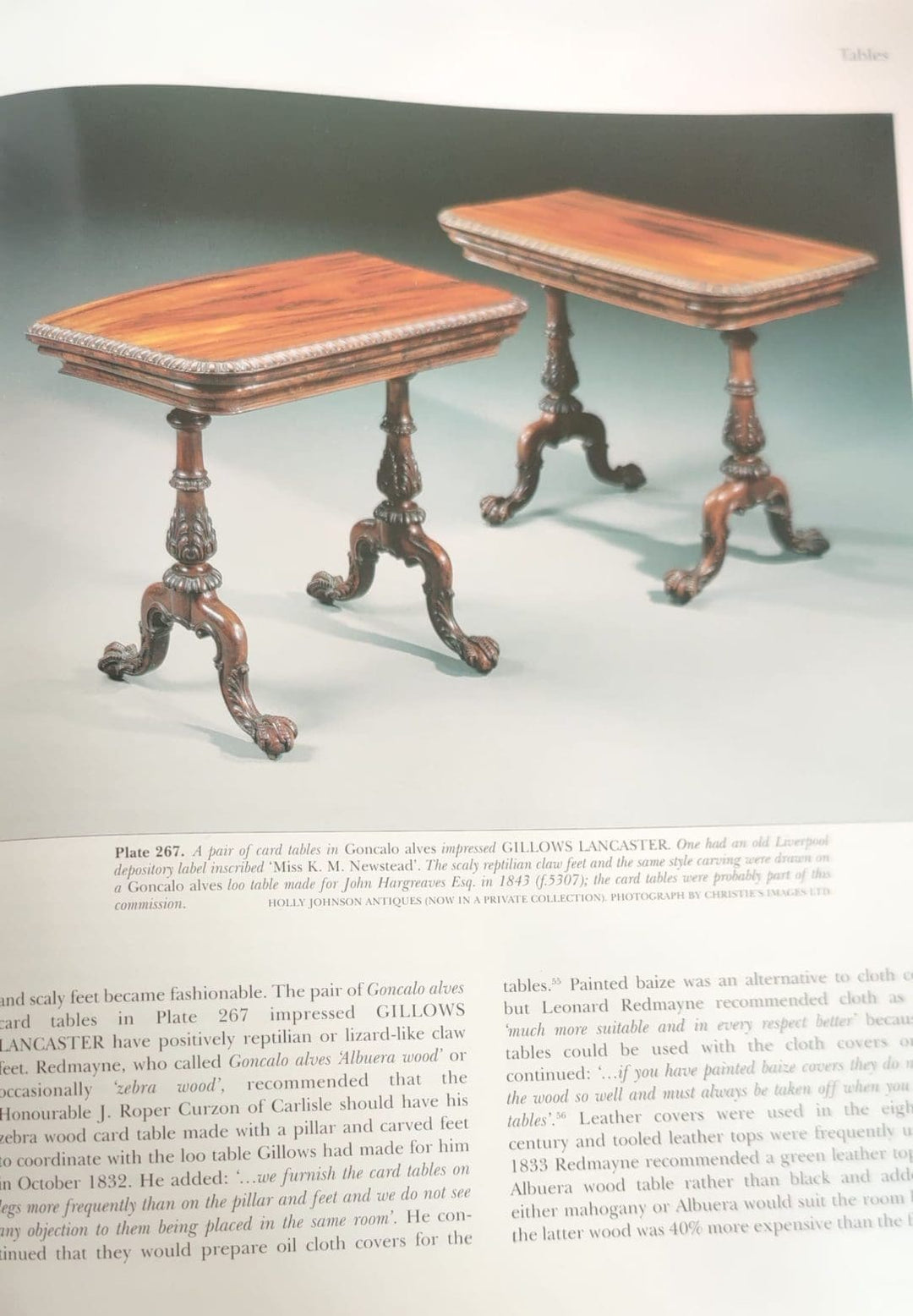 Gillows Extending Quarter Sawn Oak Circular Dining Table with carved claw feet and extending Corian leaves.