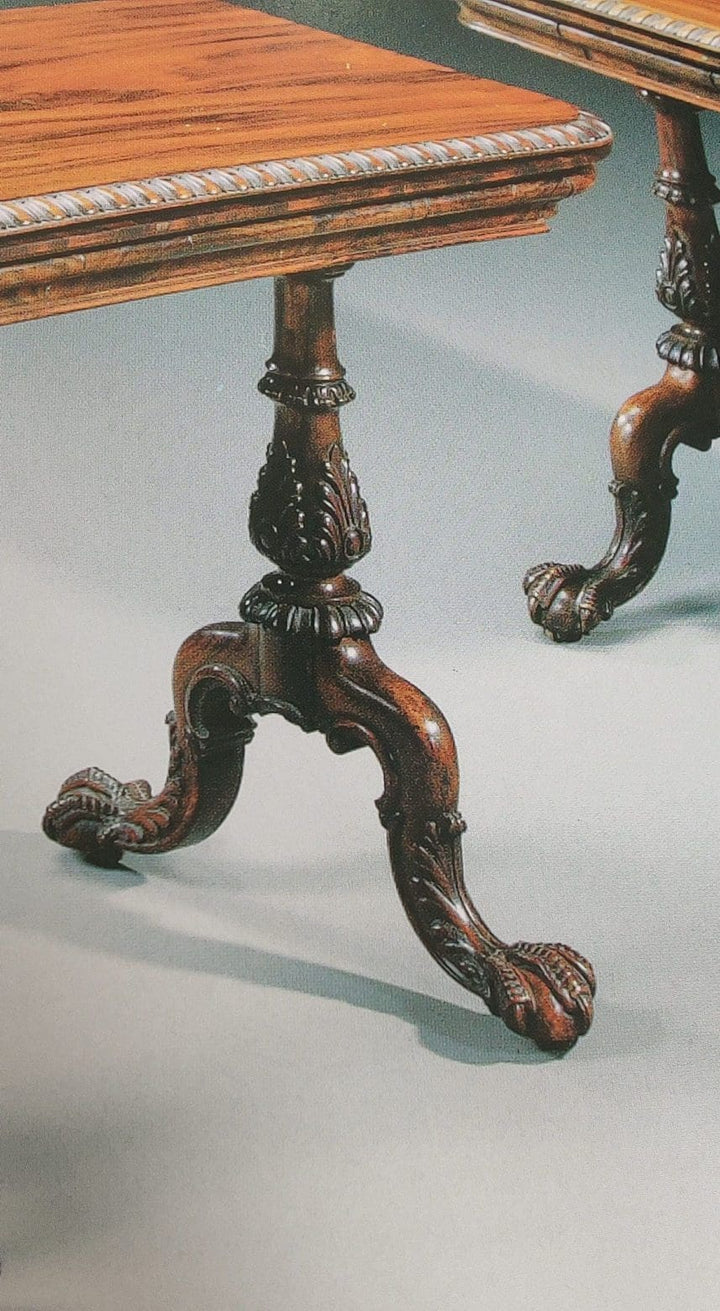 Gillows Extending Quarter Sawn Oak Circular Dining Table with carved claw feet and detailed quarter-sawn oak base.