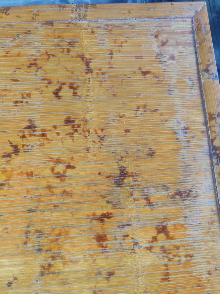 Close-up of aged bamboo top showing natural patterns on the Chinese Bamboo Folding Table circa 1960.