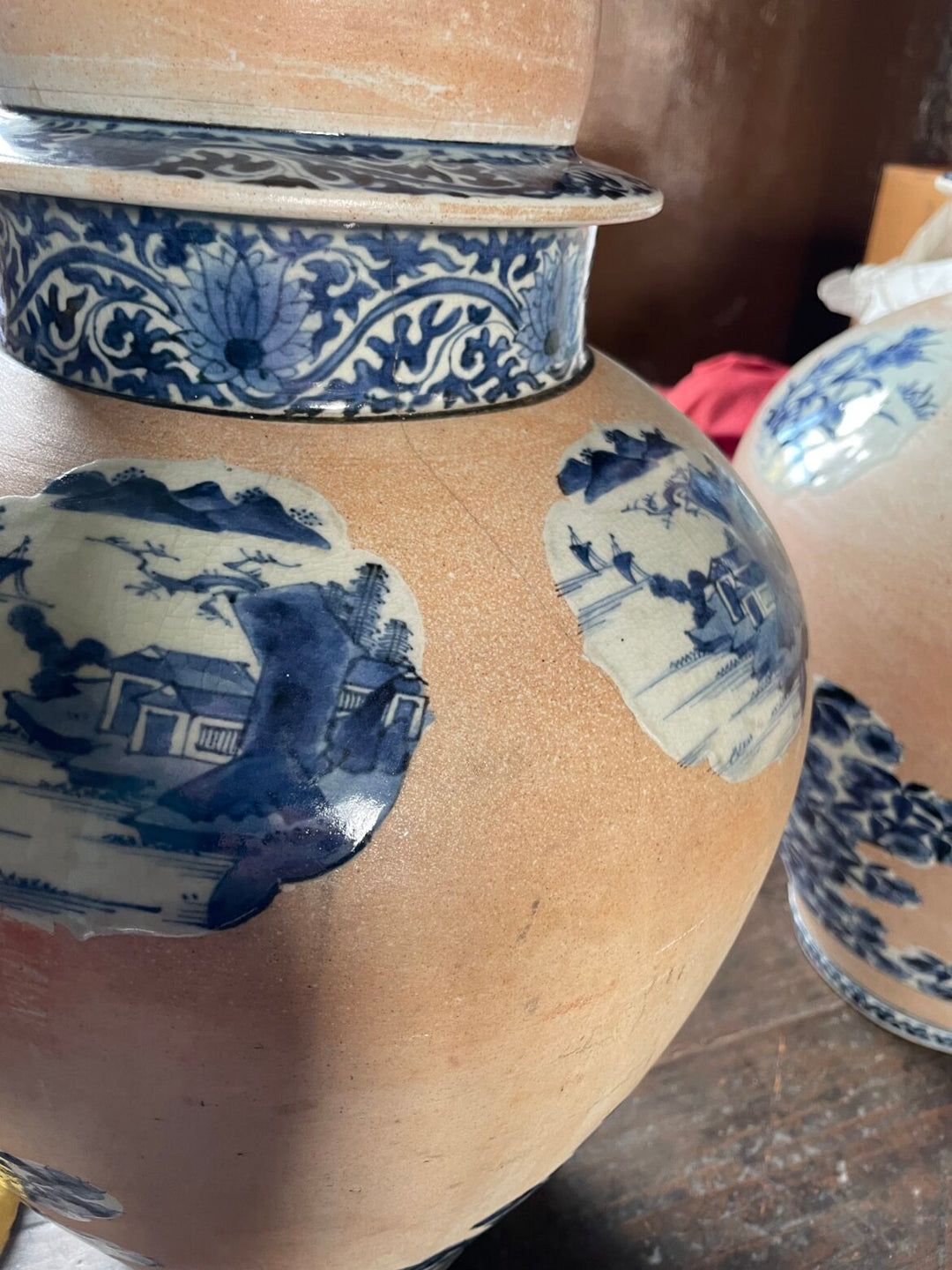 Close-up of early 18th century Arita porcelain vase with cobalt blue scenes and decorative neck from Collection EE20