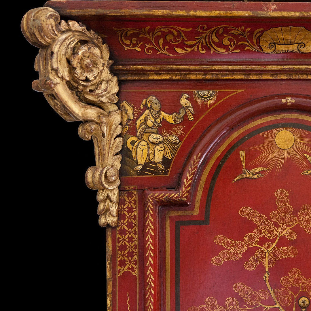 Close-up of red japanned wood with gilt carving and chinoiserie decoration from Collection TH20 Austin of Shoreditch clock