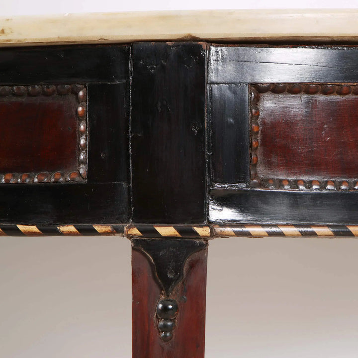 Pair of Neapolitan Demi Lune Console Tables with white marble tops and ebonised friezes inset with mahogany panels.