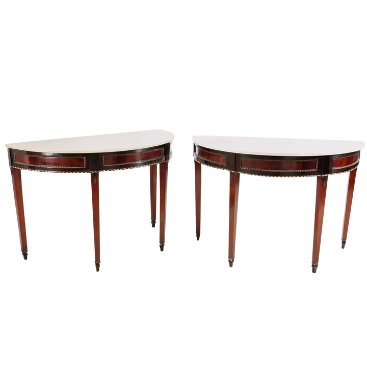Pair of Neapolitan Demi Lune Console Tables with white marble tops and ebonised mahogany details, circa 1790.