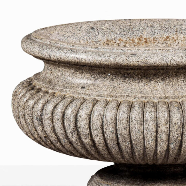Large carved porphyritic granite gadrooned oval vase on stepped base by Collection EE20 elegant design