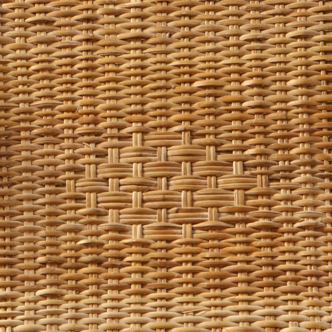 Close-up of handwoven rattan seat detailing from Modernist wireframe chairs by Collection EE30