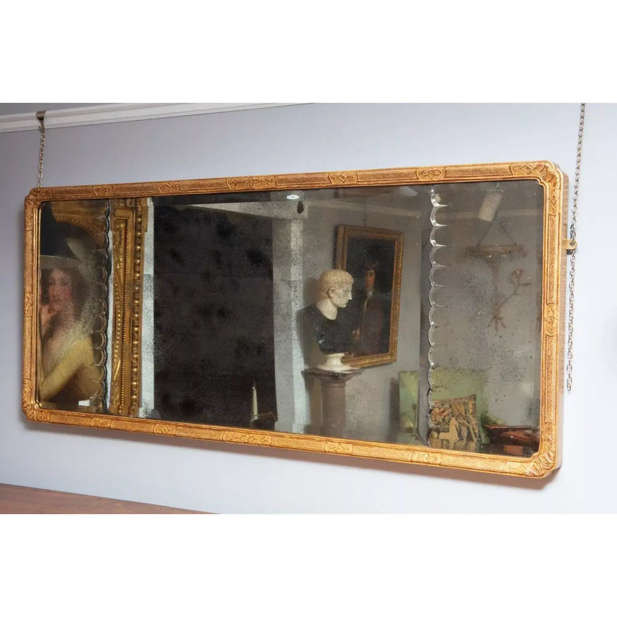Queen Anne Overmantel Mirror with original 18th century carved giltwood frame and beveled mercury mirror plates.