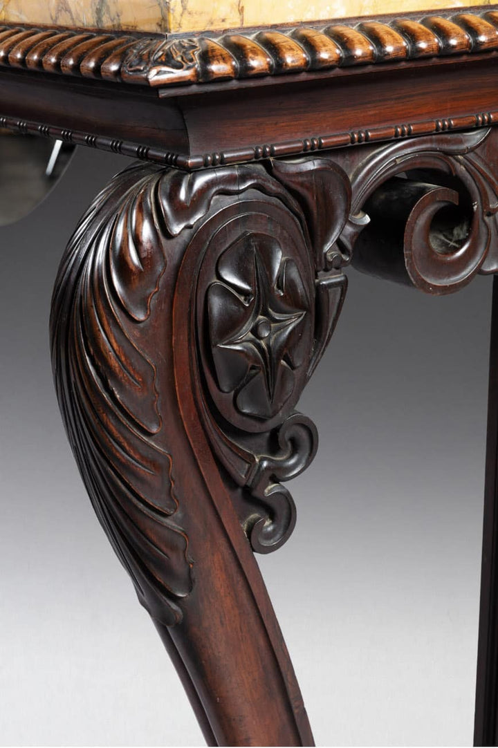 Regency Console Table in The Manner of Thomas Hope with carved mahogany zoomorphic legs and yellow Siena marble top detail.