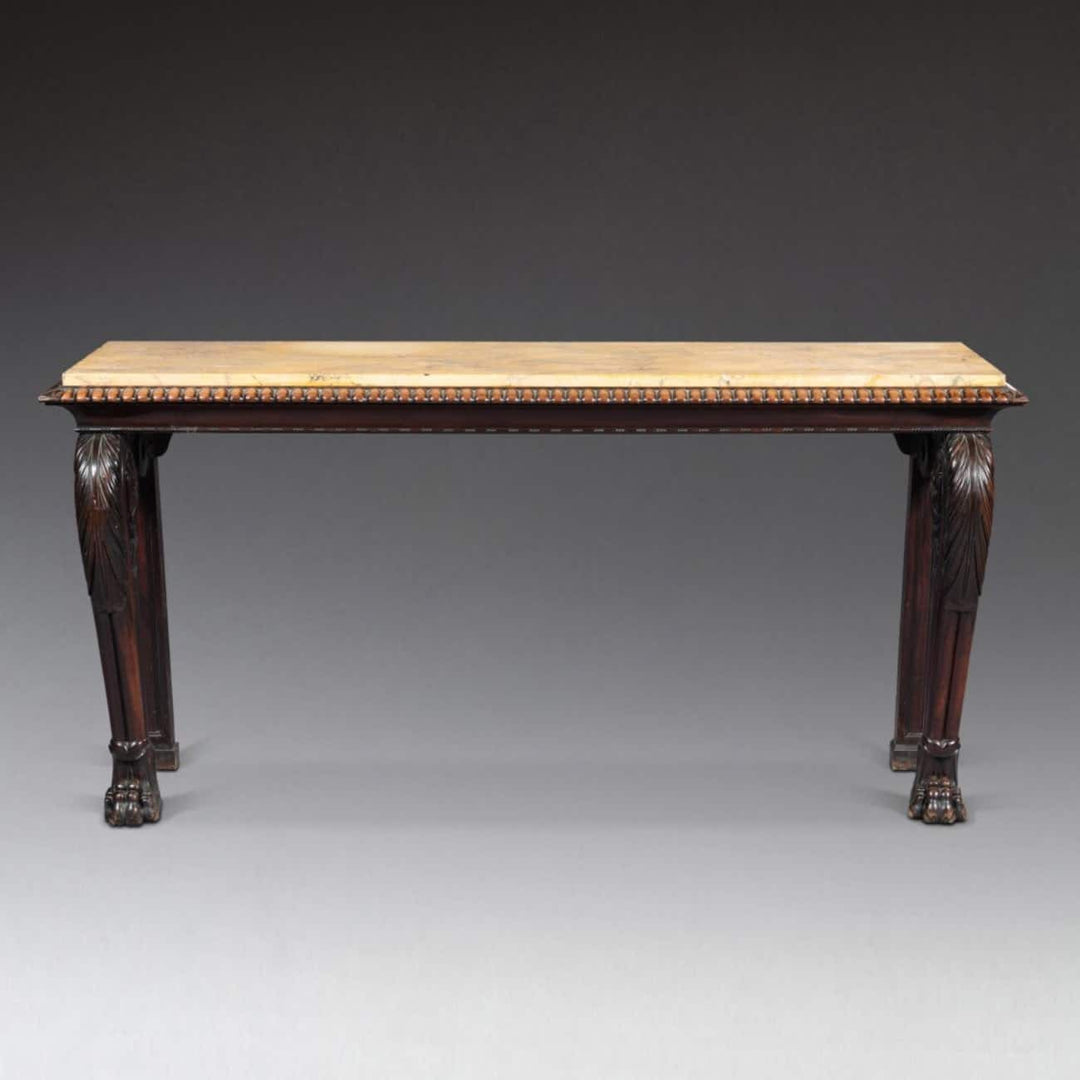 Regency Console Table in The Manner of Thomas Hope with mahogany base and yellow Siena marble top, circa 1820.