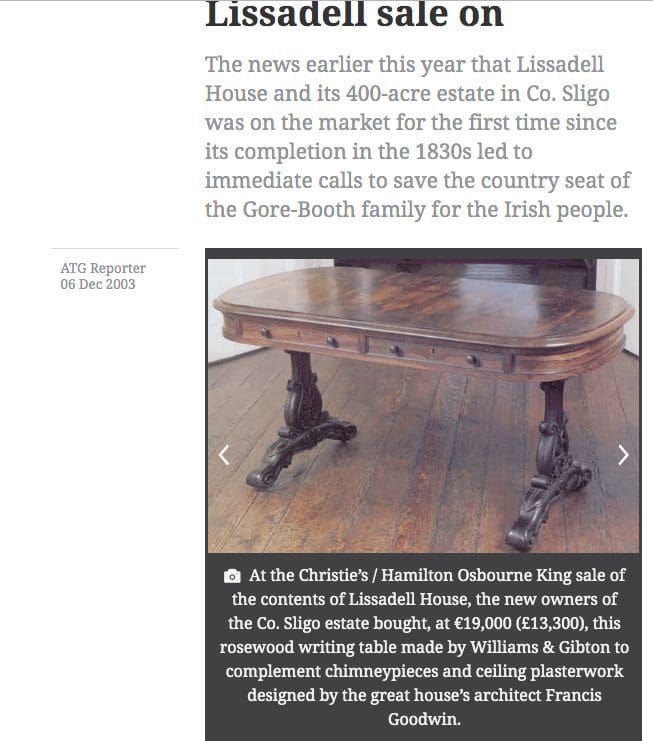 William IV Irish Rosewood Library Table By Williams & Gibton with carved legs and side drawers, circa 1835.