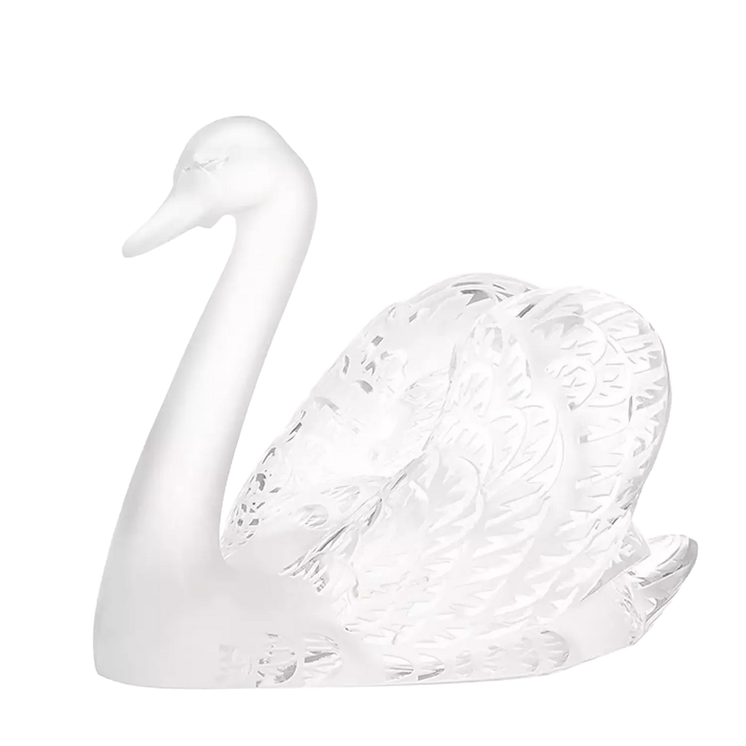 Lalique Head Up Swan crystal sculpture from 1985, elegantly crafted with detailed wings and smooth neck.