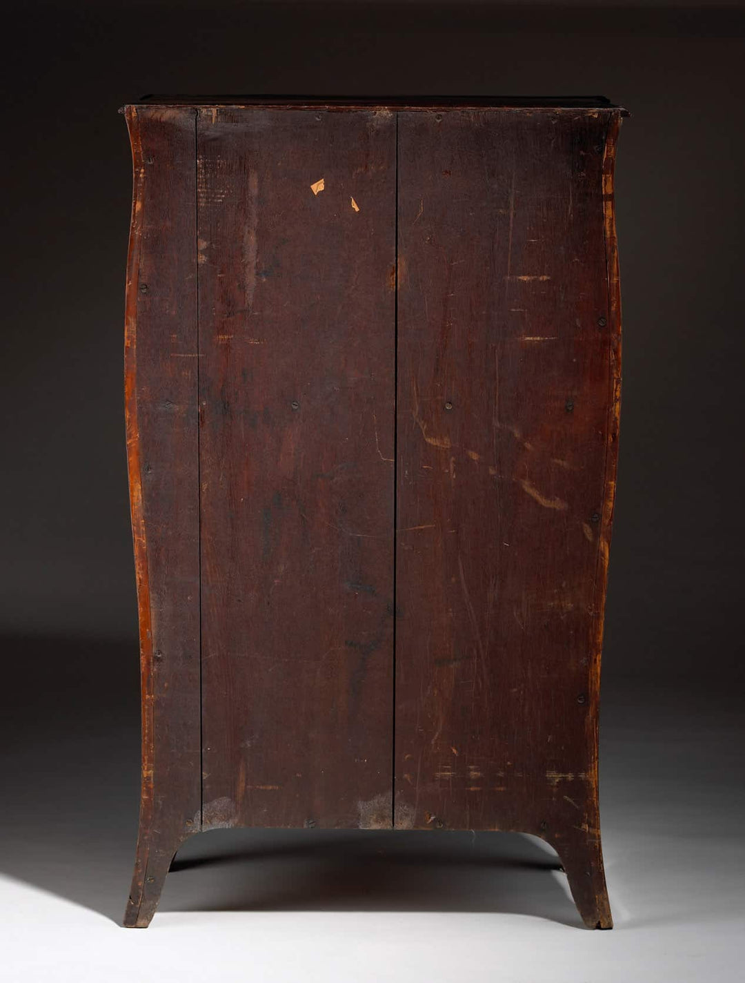 Rear view of a vintage satinwood cabinet on chest with curved bombe sides from Collection CK20