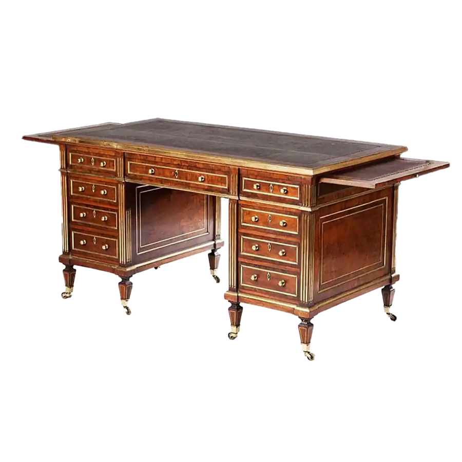 Rich Plum Pudding Mahogany and Brass Bound Pedestal Desk with multiple drawers and brass detailing circa 1870 England.
