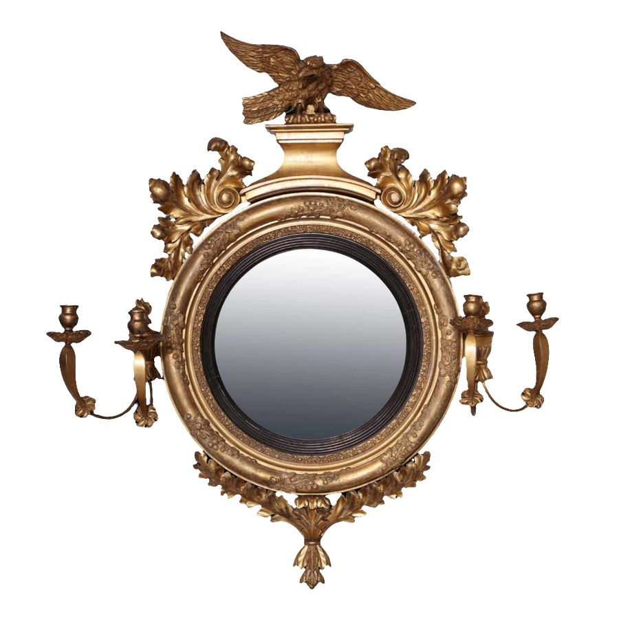 Early 19th Century British Regency Convex Mirror with giltwood frame, eagle crest, and candle arms, circa 1810.