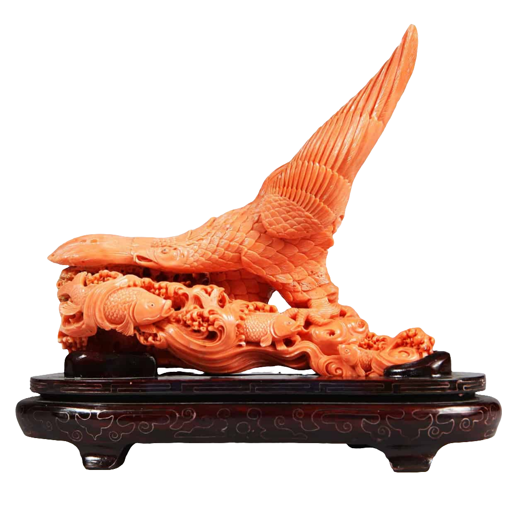 Japanese carved coral sculpture of a Stellar’s Sea Eagle catching fish, offered by Nicholas Wells Antiques
