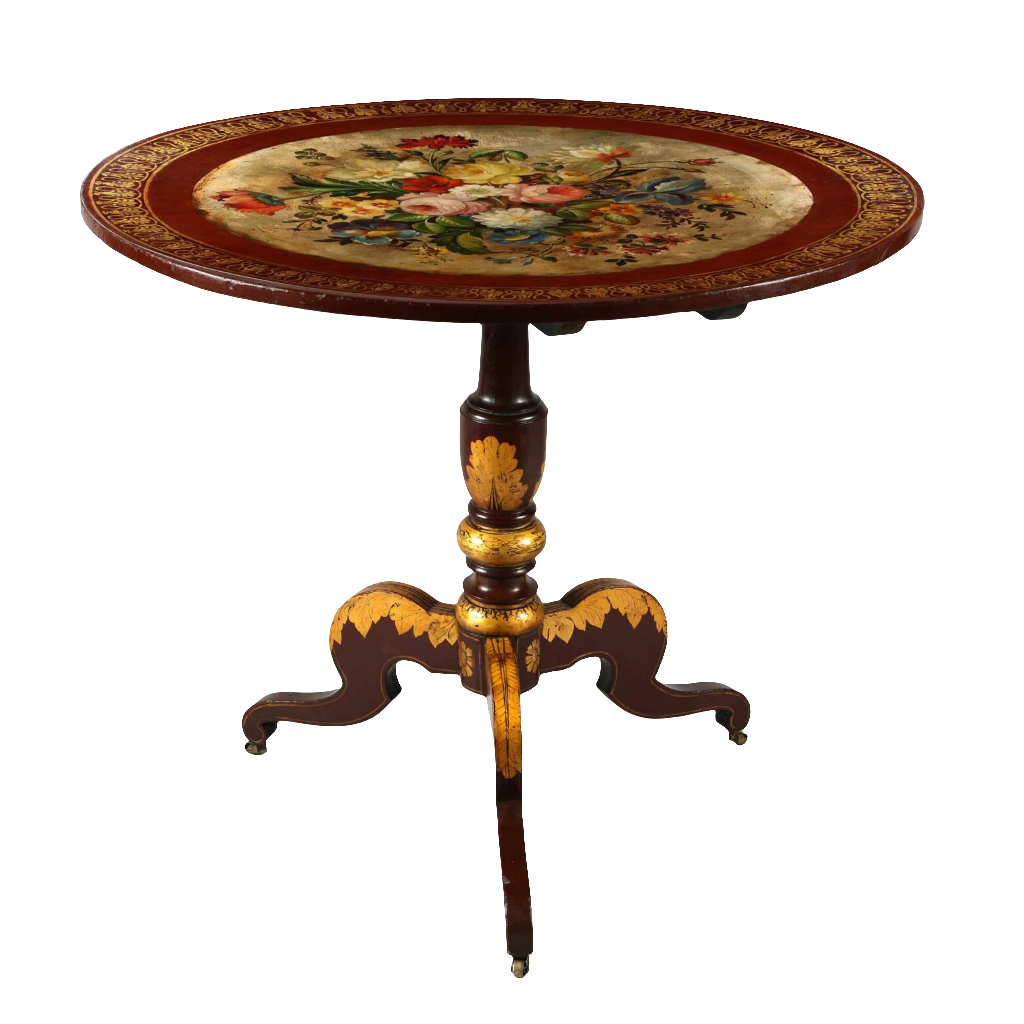 Japanned Tilt Top Occasional Table with gilt floral motif, turned baluster stem, and tripod base on casters.