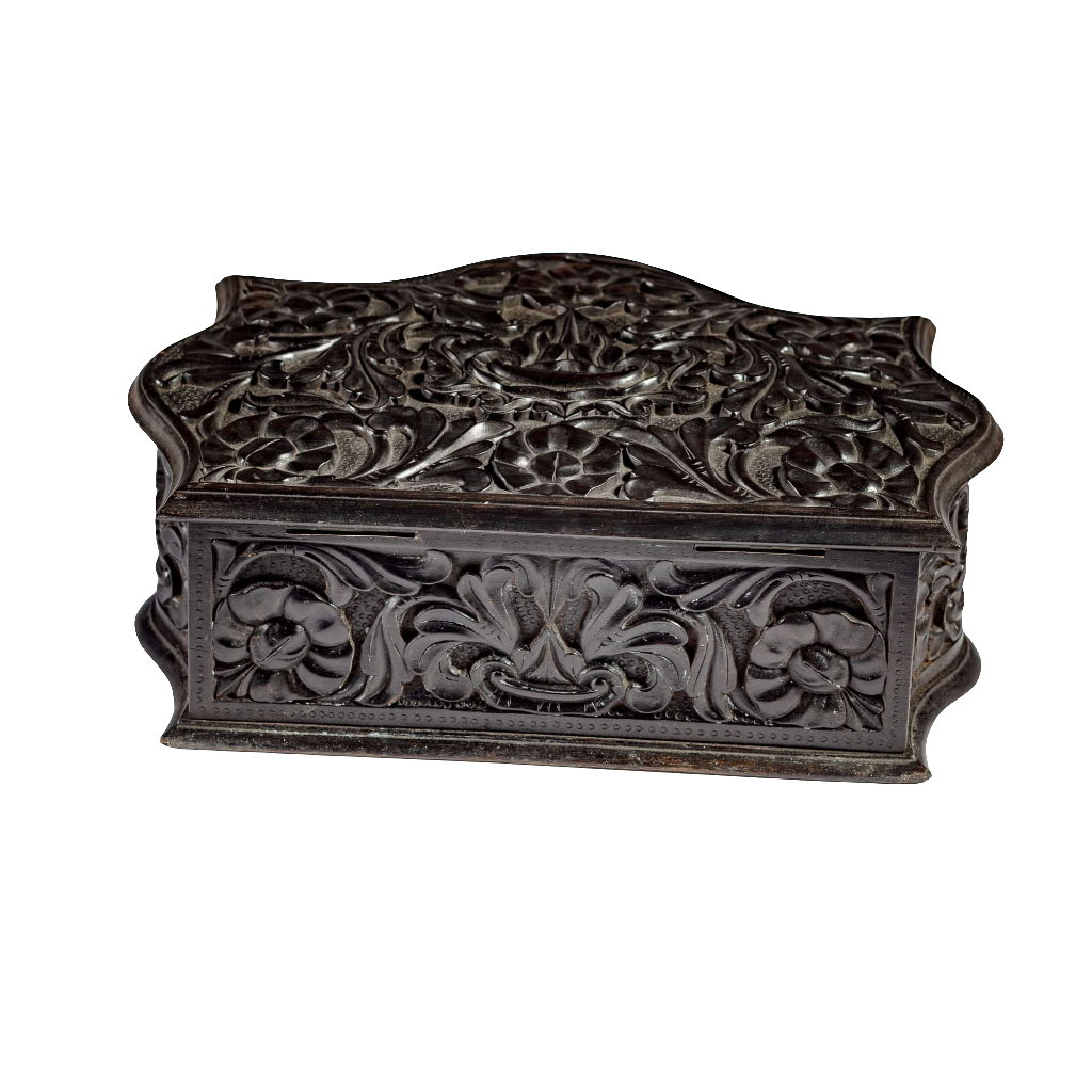 Mid 19th century carved ebony workbox with floral motifs from Ceylon, offered by Nicholas Wells Antiques