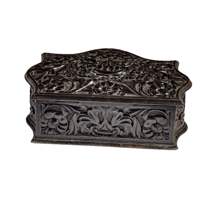 Mid 19th century carved ebony workbox with floral motifs from Ceylon, offered by Nicholas Wells Antiques
