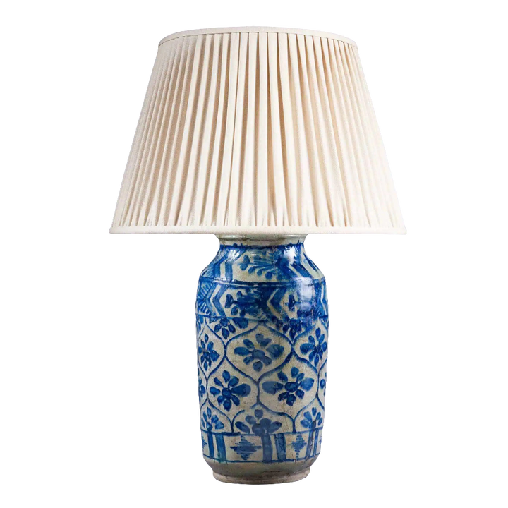 Qajar pottery Vase mounted as a Lamp with blue floral geometric patterns on a glazed biscuit base circa 1850.