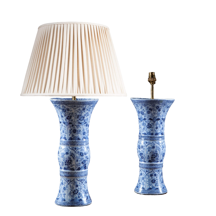 Pair of Delft Blue and White Kangxi Table Lamps with floral patterns, inspired by Chinese Gu vase design.