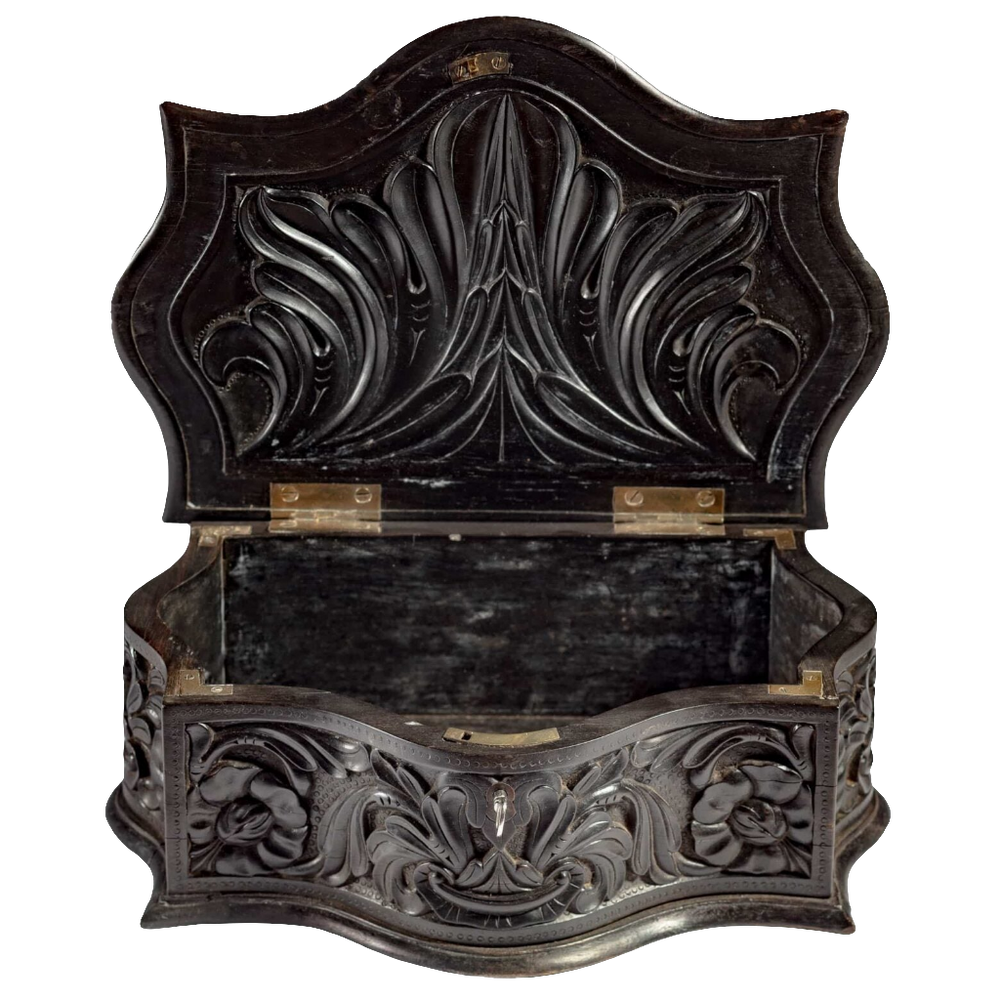 Mid 19th century carved ebony workbox with floral relief by Nicholas Wells Antiques, open showing interior details