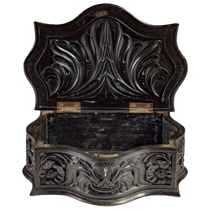 Mid 19th century carved ebony workbox with floral relief by Nicholas Wells Antiques, open showing interior details