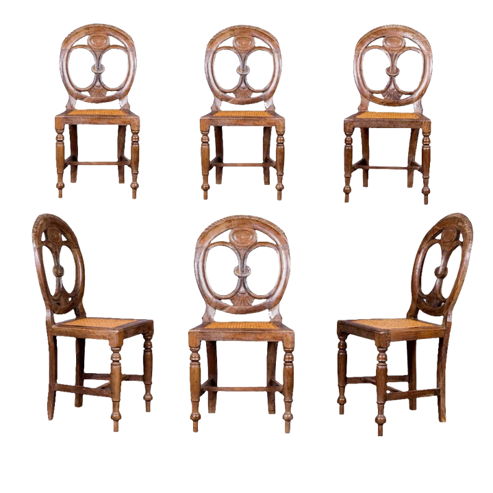 Set of six 19th century Goan side chairs with pierced oval backs and caned seats by Nicholas Wells Antiques