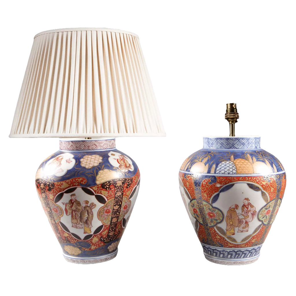 Near Pair of Japanese Imari Vases as Lamps with traditional blue, red, and gold porcelain design circa 1890, one with lamp shade.