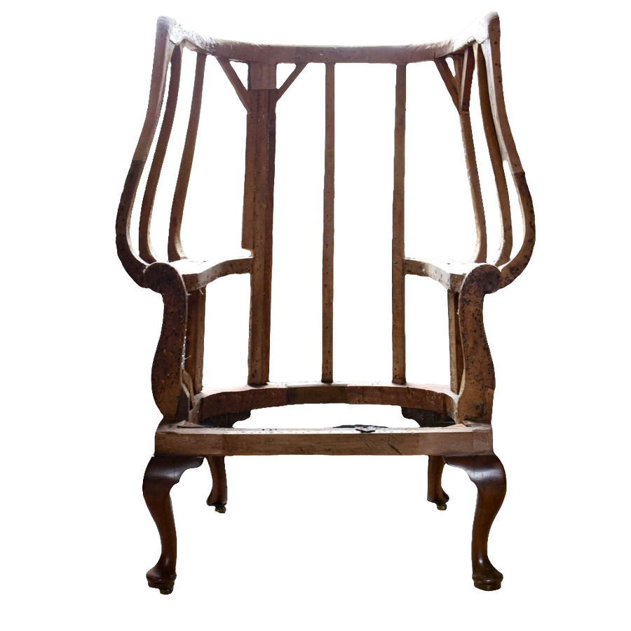 Early Georgian wing chair frame by Collection EE30, circa 1720, showcasing elegant timber craftsmanship and classic design.