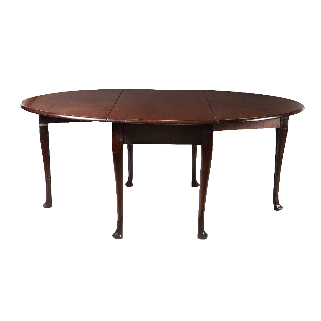 Irish George II mahogany oval drop leaf table with cabriole legs and Irish fluted pad foot, circa 1740.