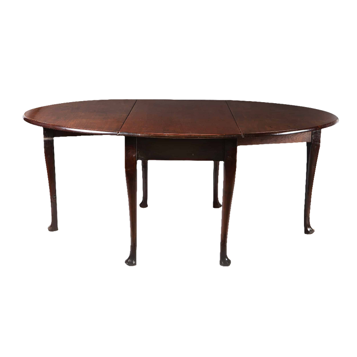 Irish George II mahogany oval drop leaf table with cabriole legs and Irish fluted pad foot, circa 1740.
