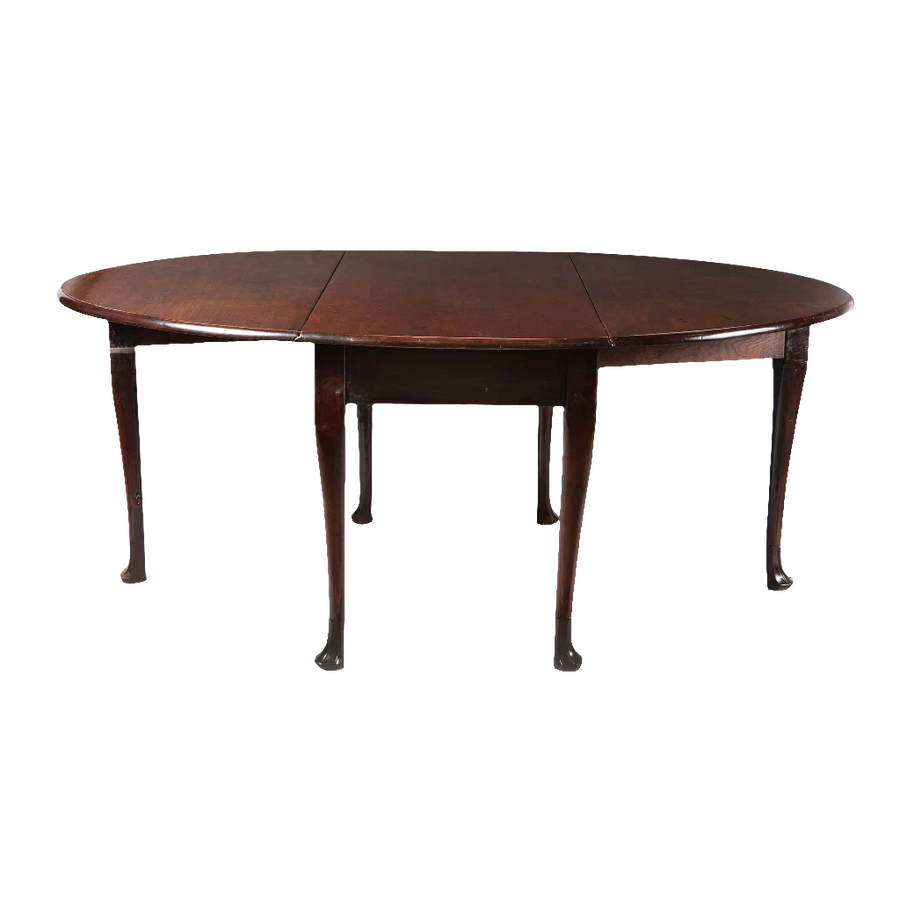Irish George II mahogany oval drop leaf table with cabriole legs and Irish fluted pad foot, circa 1740.