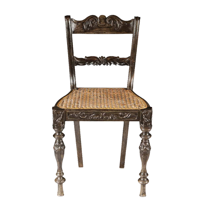 Antique Indian Ebony Side Chair with carved details and woven cane seat from Collection EE40, circa 1840.