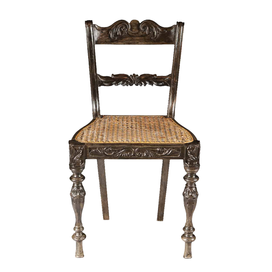 Antique Indian Ebony Side Chair with carved details and woven cane seat from Collection EE40, circa 1840.