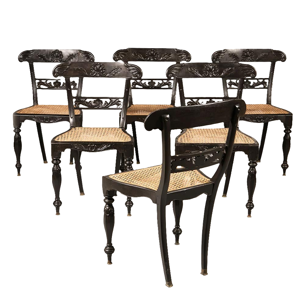 Set of six Anglo Indian ebony side chairs with caned seats and carved details by Collection EE30