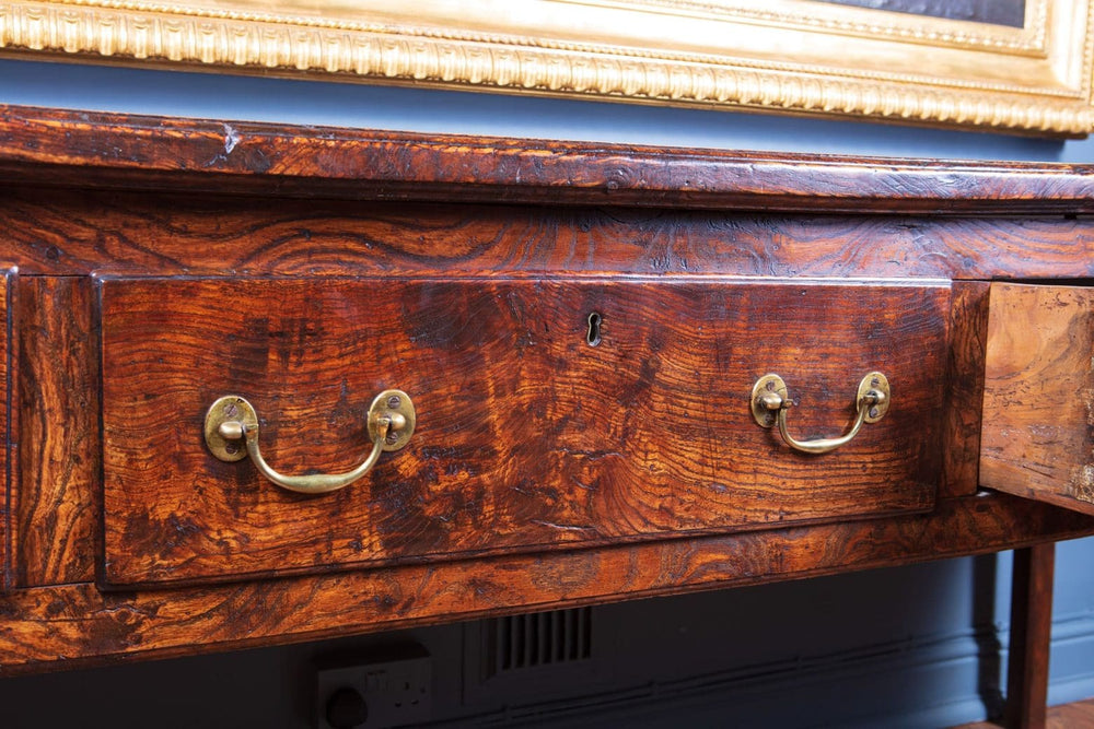 Close-up of figured elm drawer with brass drop handles on Welsh dresser base from Collection CK20