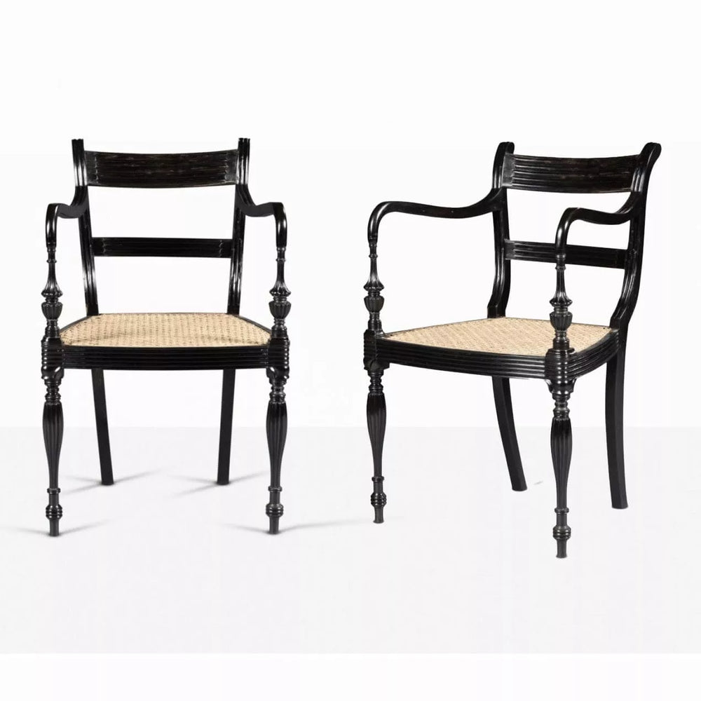 Pair of Anglo-Ceylonese ebony open armchairs with caned seats by The Sold Archive, circa 2000, elegant colonial design