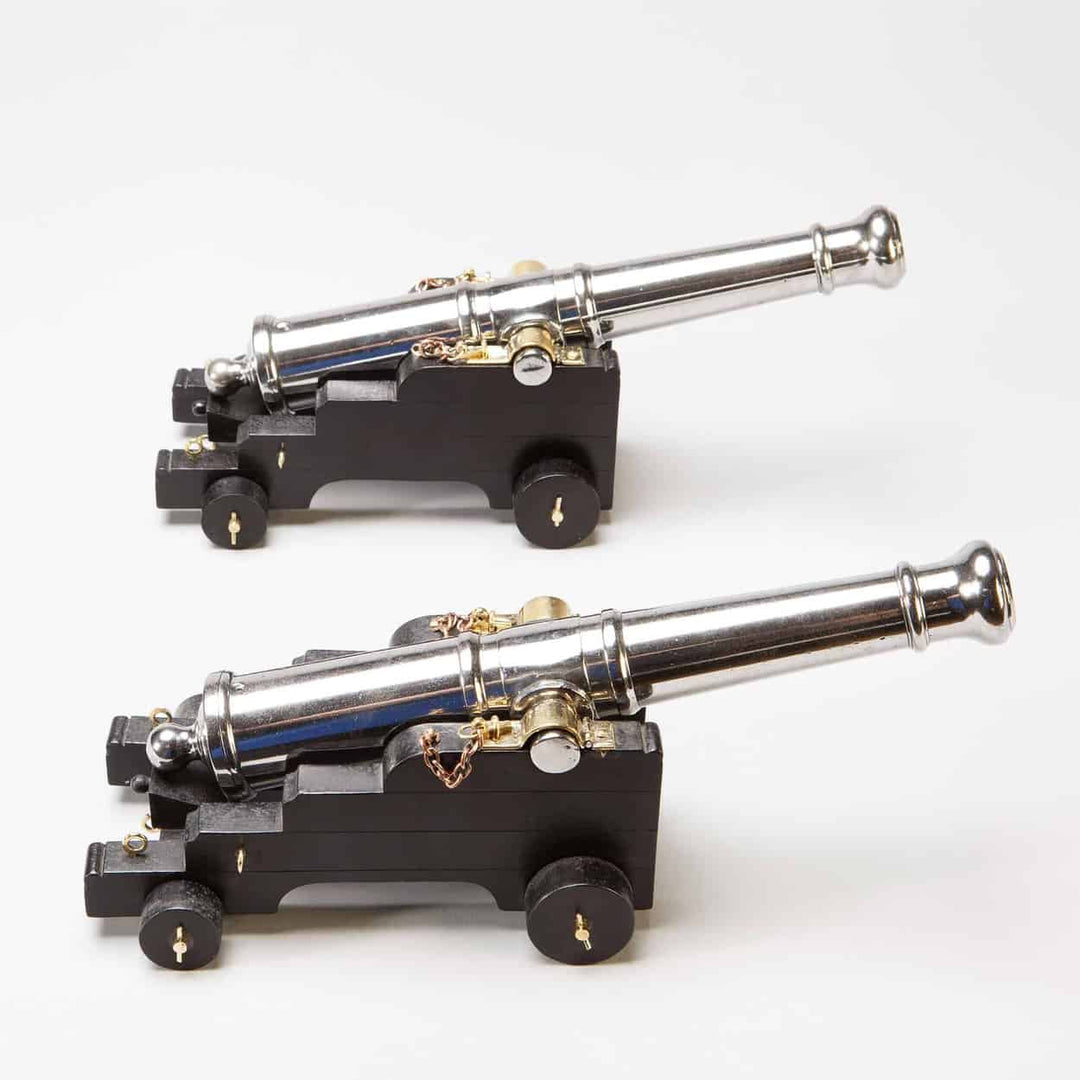 Pair Of Polished Steel 9 Pound Model Cannon